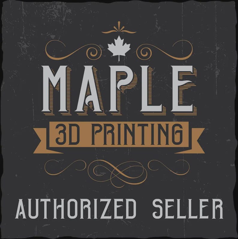 May include: A dark gray square sign featuring the white text MAPLE with a white maple leaf icon above it. Below, a tan banner contains the black text 3D PRINTING. The bottom of the sign displays the white text AUTHORIZED SELLER with flourishes.