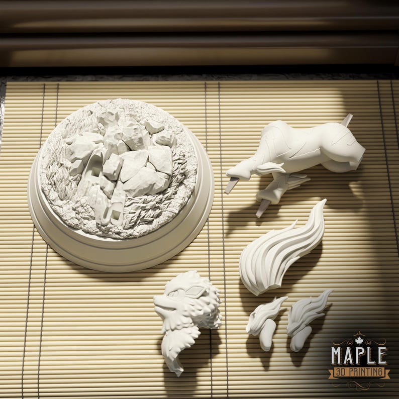 May include: A white unpainted 3D printed model kit featuring a circular rocky base, a quadruped animal torso, a separate head with fur details, a large flowing tail, and two smaller flame-like components, with a Maple 3D Printing logo in the corner.
