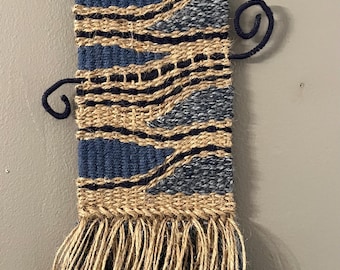 One of a kind weaving with wire, jute and yarn.