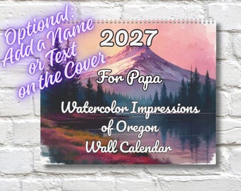 May include: A 2027 wall calendar featuring a watercolor landscape of a mountain and forest reflected in a lake. The text reads 2027, For Papa, Watercolor Impressions of Oregon Wall Calendar, and Optional: Add a Name or Text on the Cover.