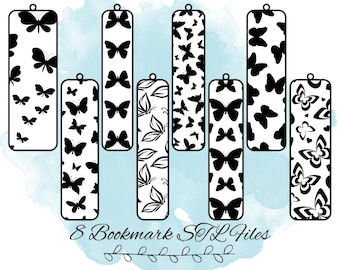 May include: Set of eight black and white butterfly bookmark designs. The bookmarks are in a vertical format and feature different butterfly patterns.