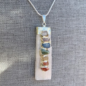 Selenite crystal wand with silver accent and 7 chakra gemstone necklace