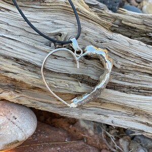 Backside of large heart chakra pendent