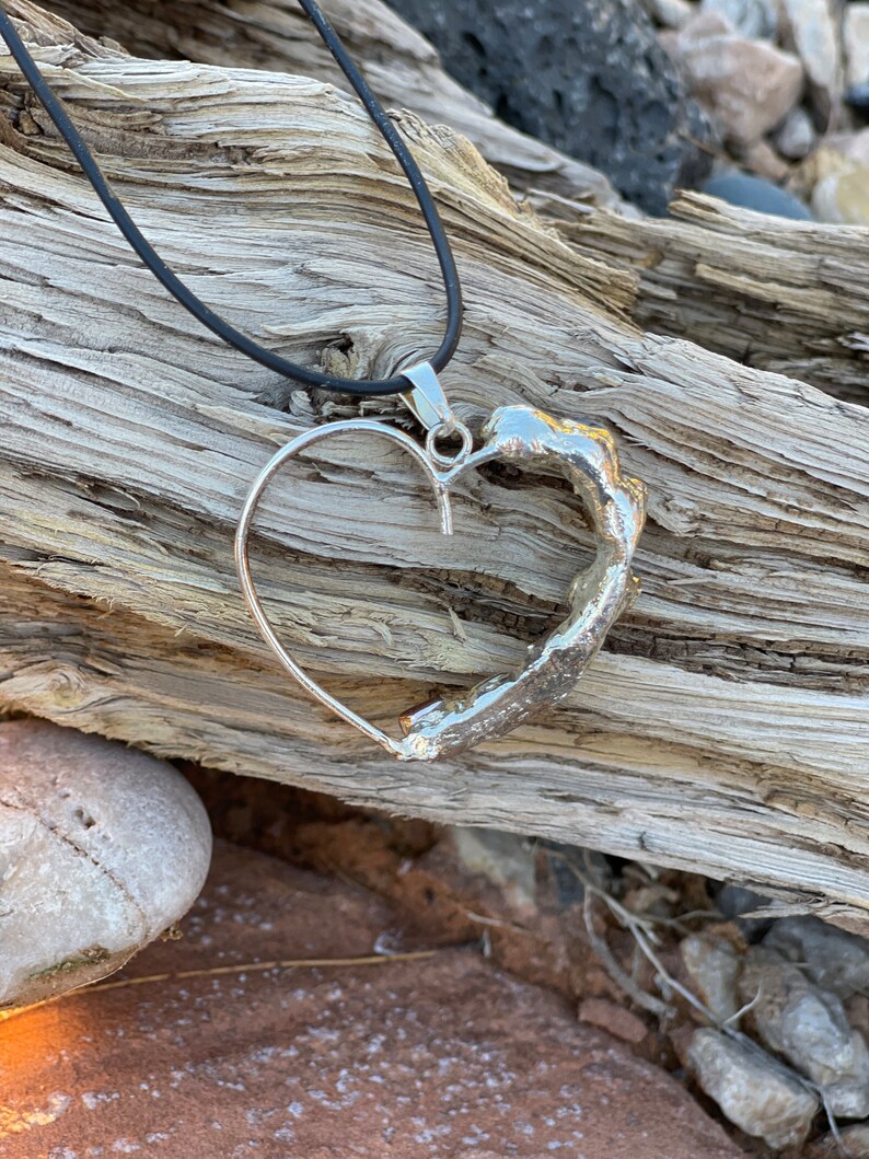 Backside of large heart chakra pendent