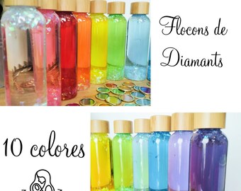 Liquid sensory bottle of Calm Diamond Flakes 10 colors. Learn the colors. Montessori sensory activity. Snoezelen method