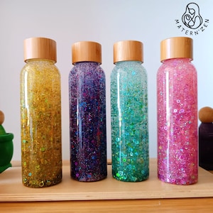 Biodegradable Circles and Glitter Liquid Sensory Bottle image 1