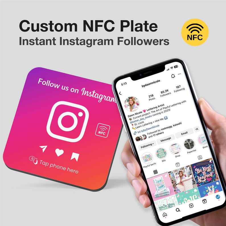 May include: A square, pink and red coaster with an Instagram logo and the text "Follow us on Instagram" and "Tap phone here". The coaster has a small NFC symbol in the corner. A hand is holding a smartphone displaying an Instagram profile with the username "bydawnnicole".