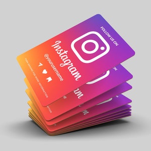 May include: A stack of colorful business cards with the Instagram logo and the text "FOLLOW US ON" and "Instagram" with the username "@yourusername". The cards are arranged in a gradient pattern from red to purple.