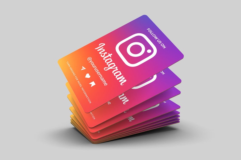 May include: A stack of colorful business cards with the Instagram logo and the text "FOLLOW US ON" and "Instagram" with the username "@yourusername". The cards are arranged in a gradient pattern from red to purple.