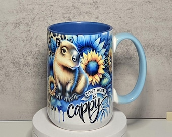 Capybara Mug: Sunflower Design, Blue Interior - 15 oz Ceramic