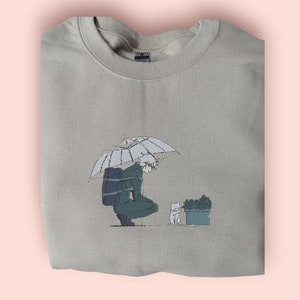 Sudadera/camiseta con cuello redondo y bordado de lluvia