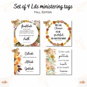 May include: Set of four printable fall-themed tags with inspirational quotes about gratitude. The tags feature watercolor illustrations of autumn leaves, pumpkins, and sunflowers.