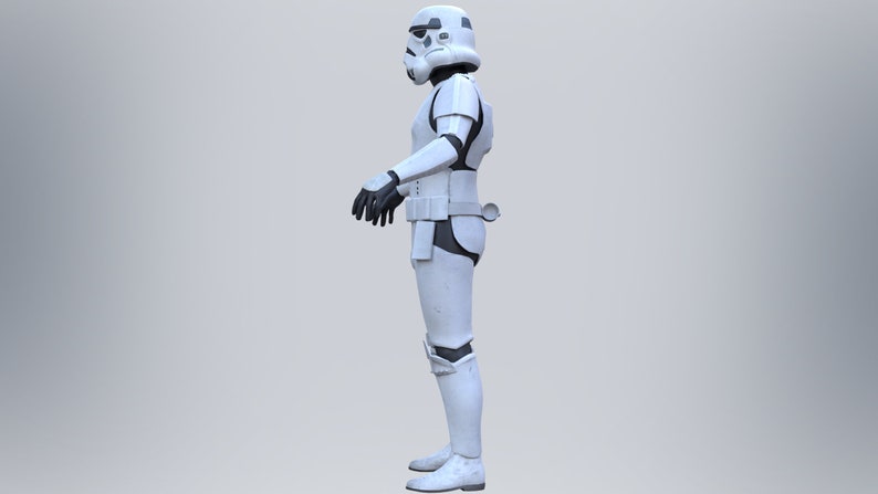 May include: A white stormtrooper action figure with black details, standing in a neutral pose with its arms by its side.