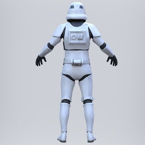 May include: A white stormtrooper action figure with a black helmet and black gloves. The figure is standing with its arms outstretched.