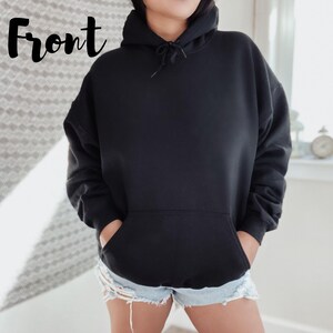 May include: A black hooded sweatshirt with a pouch pocket. The sweatshirt is made of a soft, comfortable fabric.