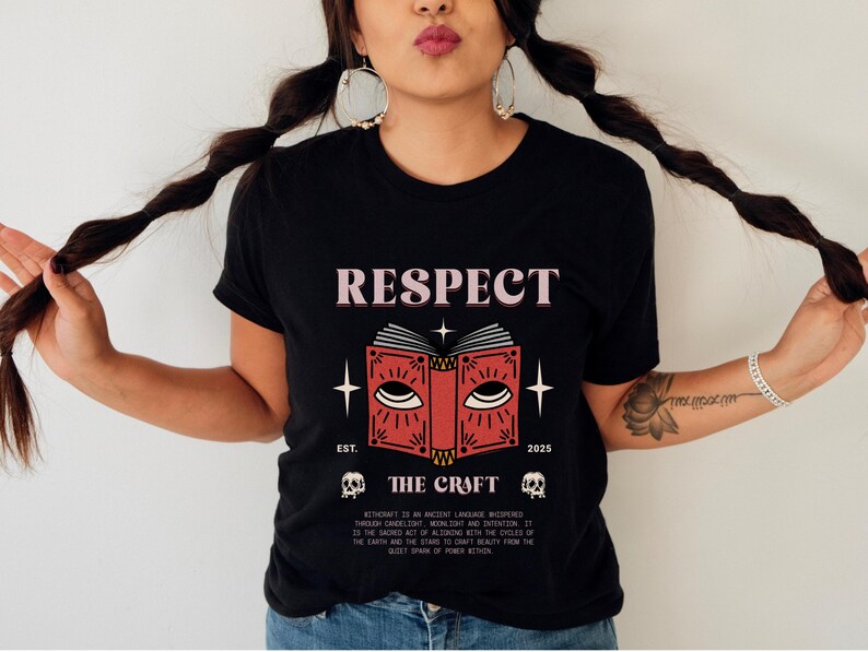 May include: Black t-shirt with the word "RESPECT" above a red book graphic with an eye and the text "THE CRAFT". The shirt also features the text "EST. 2025" and two skull graphics.