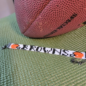 Cleveland Browns bracelet. Cleveland Browns jewelry. Browns gear. Beaded orange and brown bracelet. NFL. Woven bracelet. Seed bead bracelet.