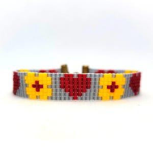 Beaded bracelet. Bead loom bracelet. Seed bead bracelet. Loom woven bracelet. Cheerful hearts and flowers. Miyuki delica jewelry. Handmade.