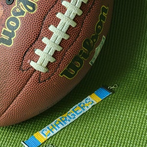 Los Angeles Chargers bracelet. Chargers jewelry. Chargers gear. Chargers fans. NFL. Beaded loom bracelet. Seed bead bracelet. Football fans.
