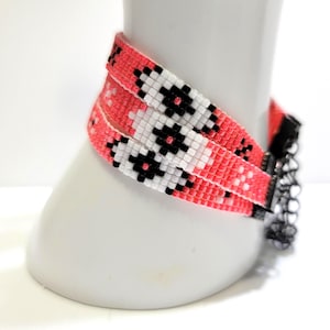 Boho woven bead loom bracelets in coral and peach, lightweight with a lobster clasp.