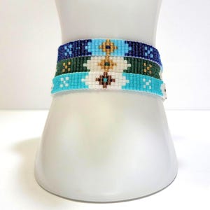 Blue and green boho wovenbead loom bracelets, lightweight and adjustable with a lobster clasp.
