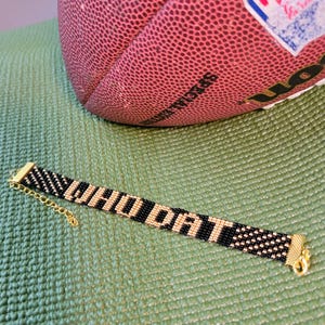 New Orleans Saints bracelet. Saints jewelry. Saints gear. Saints fans. NFL. Beaded loom bracelet. Seed bead bracelet. Football fan. Who dat.