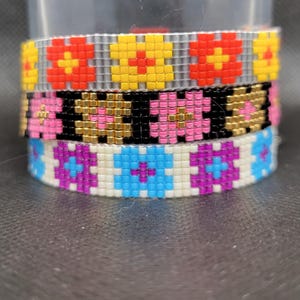 Beaded bracelet. Bead loom bracelet. Seed bead bracelet. Loom woven bracelet. Women&#39;s bracelet. Cheerful flowers. Miyuki delica jewelry.