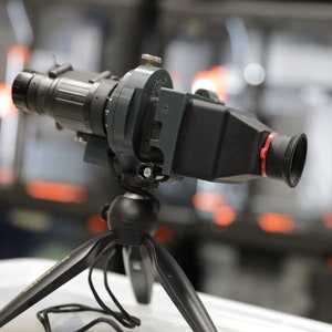 Side view of the adapter with magnifier.