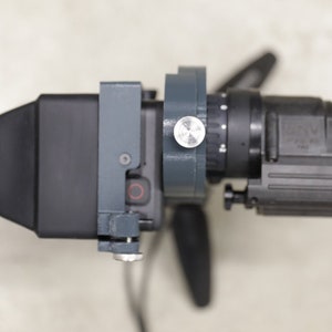 Top view of adapter with magnifier.