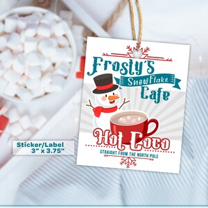 May include: A printable sticker or label featuring a cartoon snowman with a red cup of hot cocoa. The text reads "Frosty's Snowflake Cafe Hot Coco Straight from the North Pole". The sticker is 3 inches by 3.75 inches.