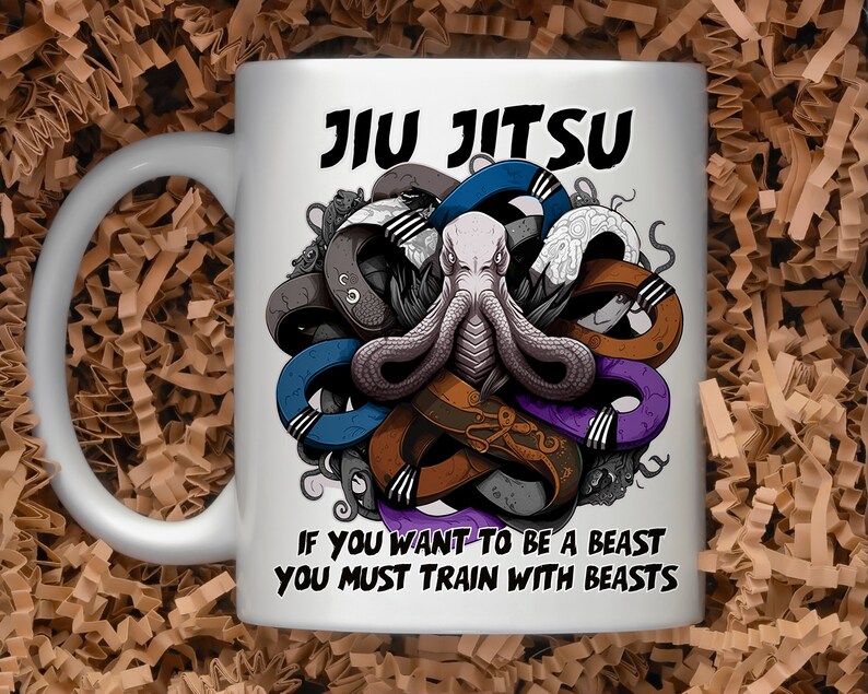 May include: White ceramic mug with a graphic of a purple, blue, brown, and gray octopus with the text "Jiu Jitsu" and "If you want to be a beast you must train with beasts".