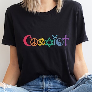 SHIRT WITH A DESIGN SAYING COEXIST WITH ALL RELIGIOUS SYMBOLS FOR CATHOLIC, MUSLIM, JEWISH.