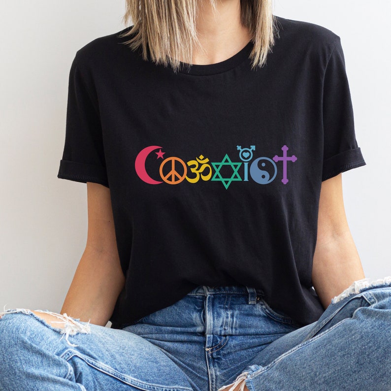 SHIRT WITH A DESIGN SAYING COEXIST WITH ALL RELIGIOUS SYMBOLS FOR CATHOLIC, MUSLIM, JEWISH.