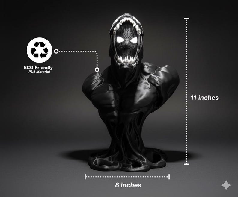 Puede incluir: Un busto negro de un personaje inspirado en Venom, de 28 cm de alto y 20 cm de ancho. La figura tiene una cara detallada con una boca abierta y ojos brillantes. La base es un dise&ntilde;o texturizado y fluido. Tambi&eacute;n est&aacute; presente el texto "ECO Friendly PLA Material".