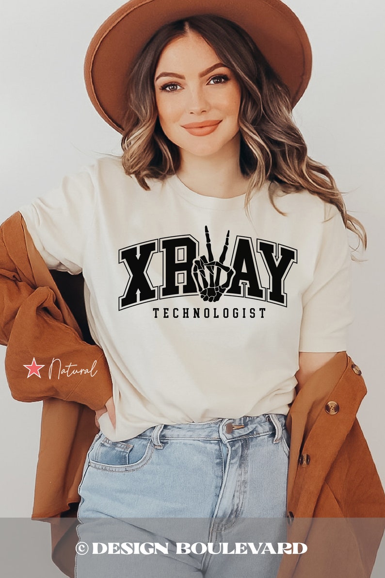 May include: A white t-shirt with a black graphic of a skeleton hand making a peace sign and the text "XRAY TECHNOLOGIST".