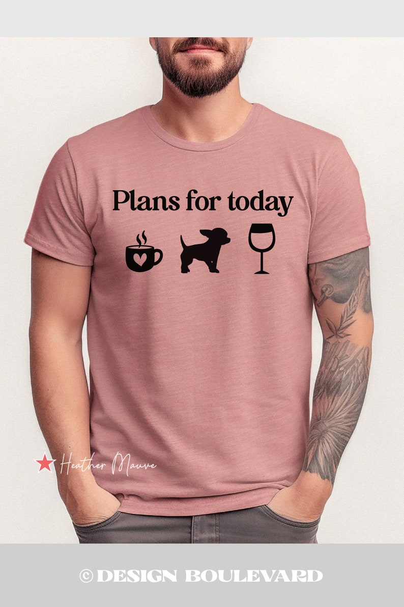 May include: A heather mauve short-sleeve t-shirt featuring the black text "Plans for today" above three black icons: a coffee mug with a heart, a silhouette of a small dog, and a wine glass. The shirt has a crew neckline and a standard fit.