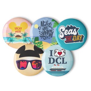 May include: Five round buttons with different designs. The first button is yellow with a palm tree and the text "Vacay Mode". The second button is blue with a sun and the text "Make a Splash". The third button is turquoise with the text "Seas the Day". The fourth button is yellow with a cartoon face wearing sunglasses. The fifth button is blue with a cruise ship and the text "I love DCL".