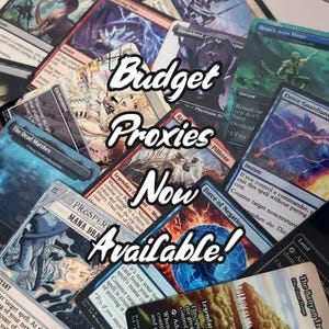 May include: A collection of Magic: The Gathering cards, with the text "Budget Proxies Now Available!" overlaid. The cards feature various illustrations and text, with a focus on gameplay elements.
