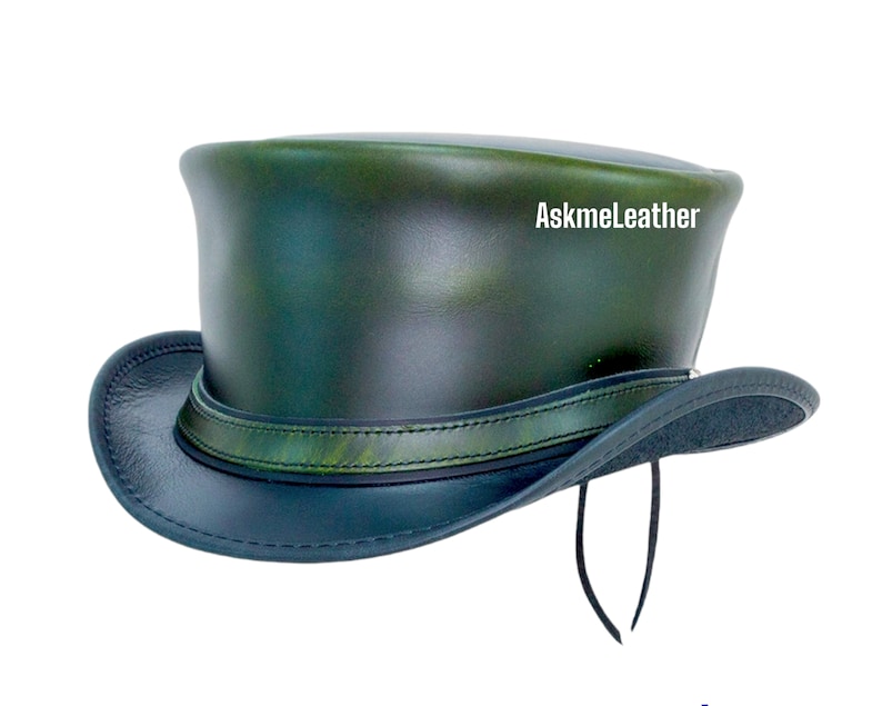 May include: A green leather top hat with a black band and a black string tie. The hat has a green and black marbled pattern and the text "AskmeLeather" is printed on the side.