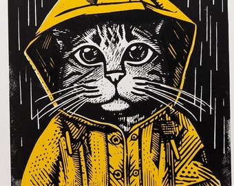 Two-color linocut print of a cat in a yellow raincoat – hand-printed illustration – art print without frame