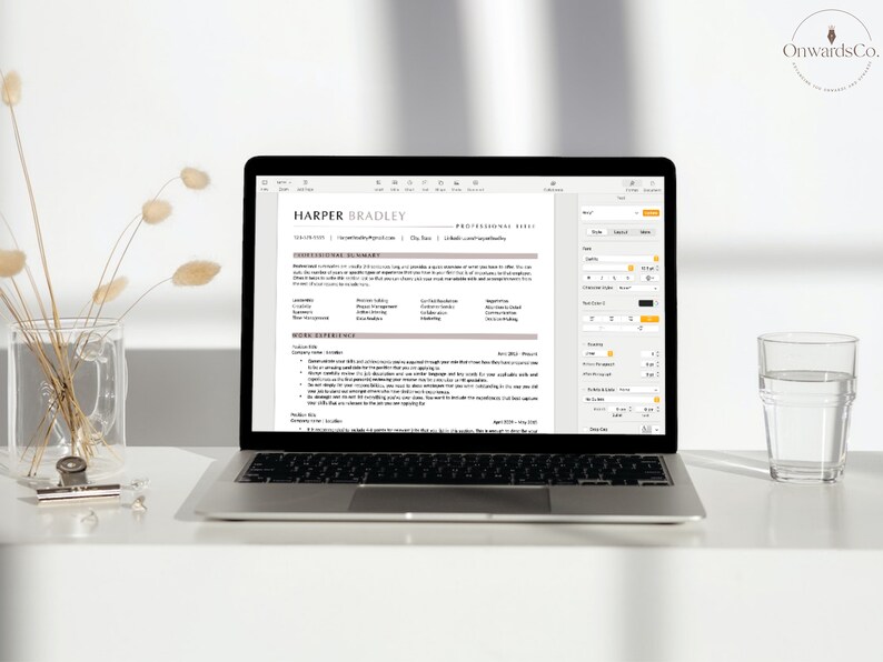May include: A laptop computer screen displaying a resume template with a light brown background and a dark grey text box. The resume is for Harper Bradley. The screen also shows a menu bar with options for font, colour, and spacing.