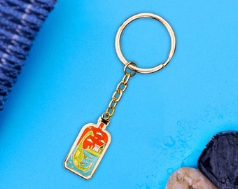 Nessie Hard Enamel Glitter Keyring - Simplistic Highlands Geographical Gift Dinosaur Loch Ness Monster Castle Souvenir Scottish Collection