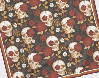 May include: A dark brown square scarf with a repeating pattern of white skulls and red roses. The scarf has a white border with a thin brown line.