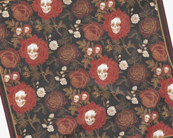 May include: Square scarf with a dark background featuring a repeating pattern of red roses, white skulls, and smaller skulls. The scarf has a burgundy border with a gold inner trim.