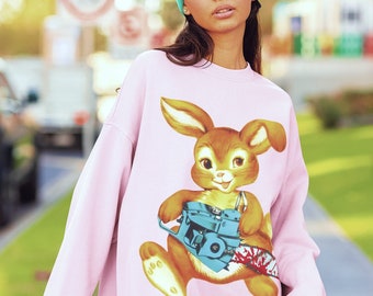 Chainsaw Bunny Unisex Crewneck Sweatshirt | Horror Easter Pastel Goth Kawaii Punk Kitsch Art Retro Vintage Style Clothing Graphic Pullover