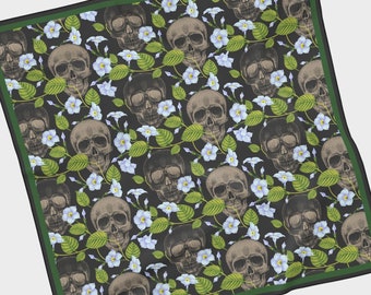 May include: A black square scarf with a green border features a repeating pattern of white flowers and grey skulls.