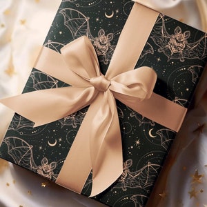 Our Celestial Bats Wrapping Paper is the cherry on top to a great gift. The perfect wrapping paper for bohemian gothic, whimsigoth, witchy, horror, dark academia, occult, Halloween themed birthday, romantic anniversary, wedding, or Christmas gifts.