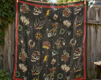 May include: Black square scarf with a red border, adorned with vintage tattoo-style illustrations. The design includes skulls, swallows, dice, anchors, roses, and other classic tattoo motifs. The scarf is hanging on a clothesline.