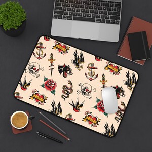Our Tattoo Print Desk Mat is great for that extra personal touch at work or in your home office. These are the perfect addition to your retro, vintage, old school, traditional sailor tattoo, rockabilly themed gaming desk setup.