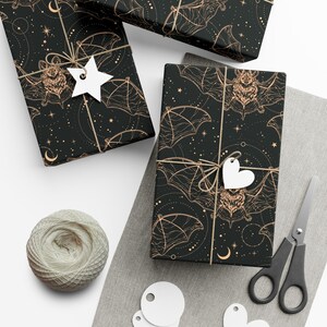 Our Celestial Bats Wrapping Paper is the cherry on top to a great gift. The perfect wrapping paper for bohemian gothic, whimsigoth, witchy, horror, dark academia, occult, Halloween themed birthday, romantic anniversary, wedding, or Christmas gifts.